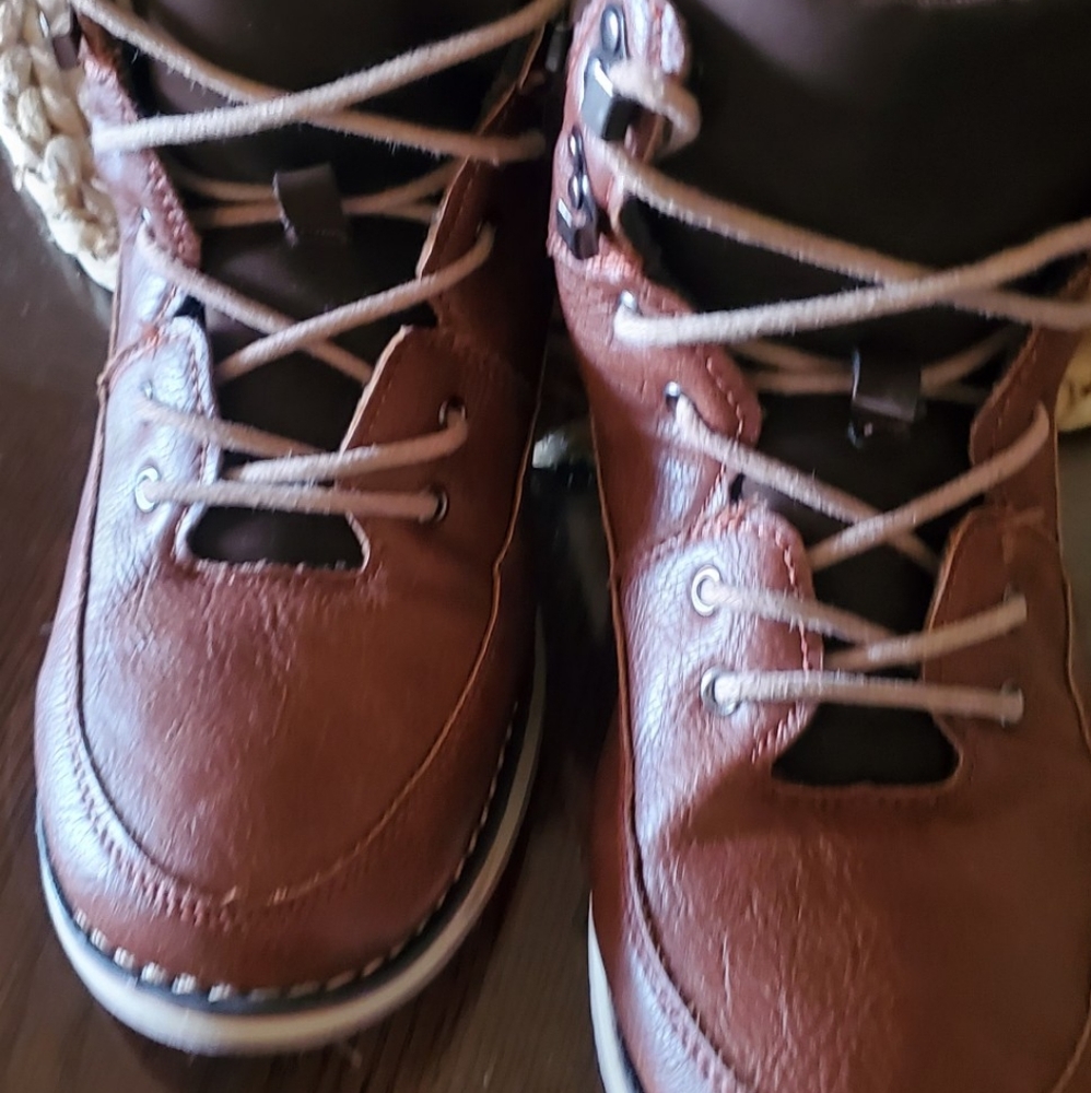 Boys Steve Madden brown boots.
